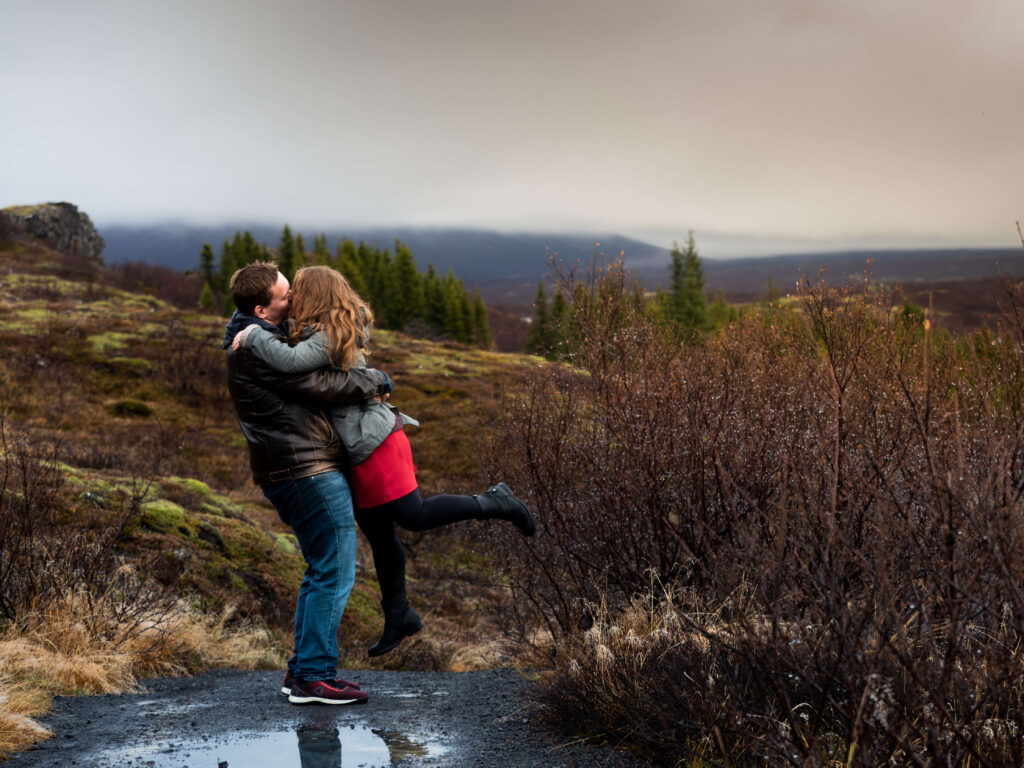 Honeymoon couple cuddling in Iceland